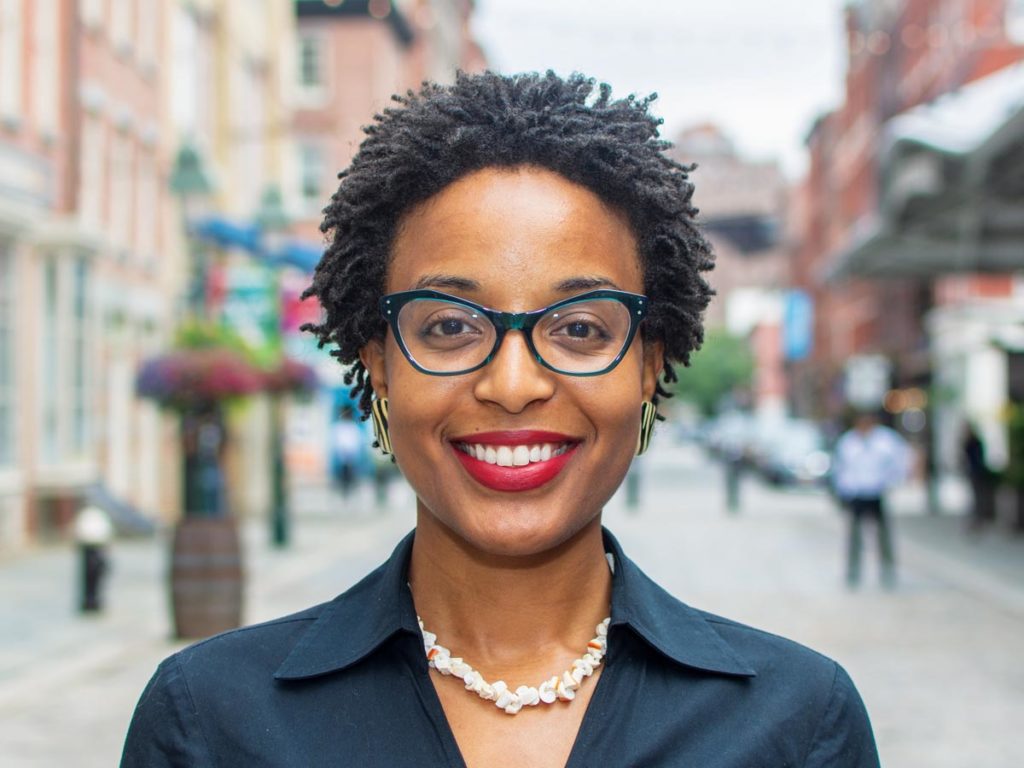 Jane Roberte-Sampeur stands outside in Manhattan
